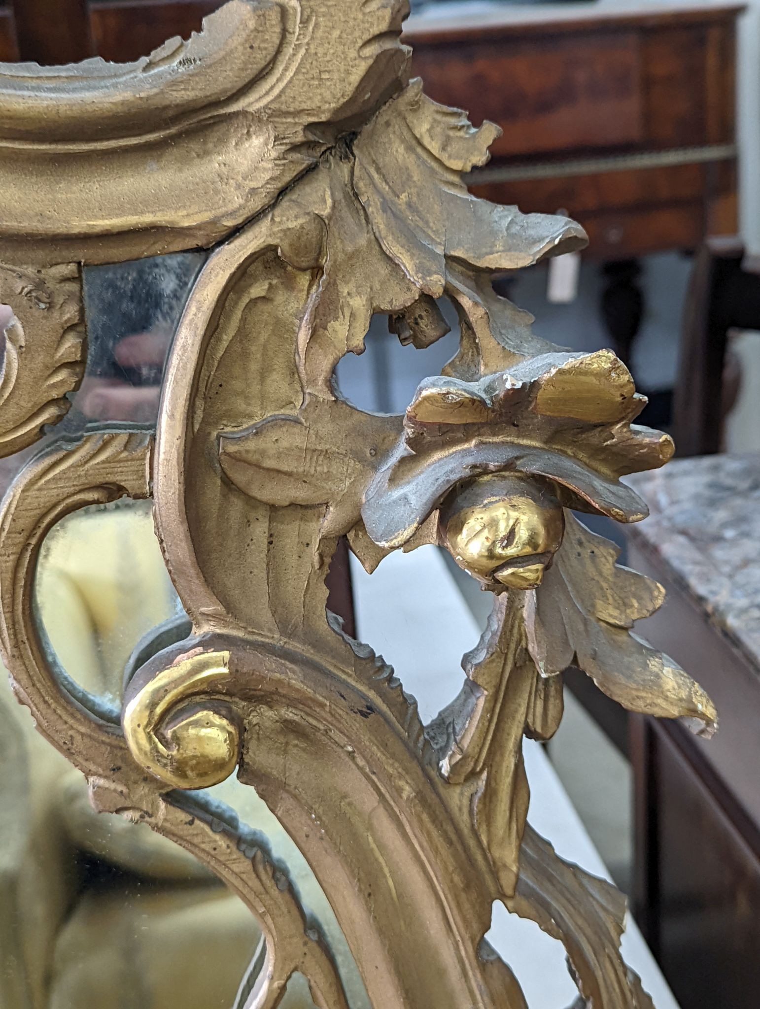 A Victorian style carved giltwood overmantel mirror, width 140cm, height 125cm